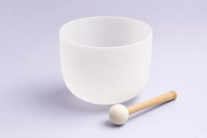 Single 8-inch frosted quartz crystal singing bowl with a wooden mallet